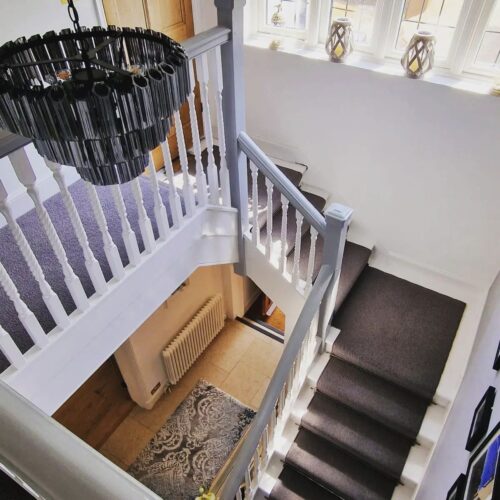 Staircase Refresh with Wool Berber Carpet and Modern Stair Rods